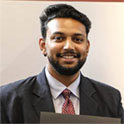 Student holding award