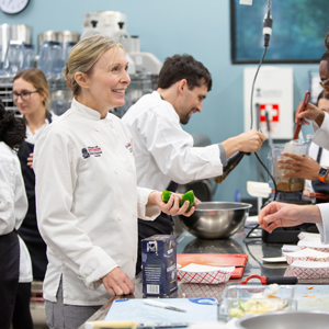 Jennifer Trilk teaches students how to prepare healthy meals during the culinary medicine program